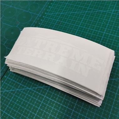 Autocollant blanc découpé